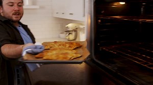 These apple turnovers come together very quickly. Toss apple with sugar and a few spices and fold in some puff pastry and you have the perfect portable, sweet treat. | Delish