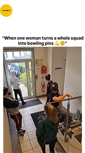 nextclip.io on Instagram: "The post shares a December 2024 surveillance video clip showing a woman in a green hoodie dramatically throwing down multiple young men during a confrontation at a building entrance, captioned as "super satisfying" and attracting over 3.6 million views within days. Viewer reactions in the thread question its authenticity, citing choreographed movements, uniform reactions, and a final frame where one man appears to retrieve an item from a bag, suggesting it's likely a s