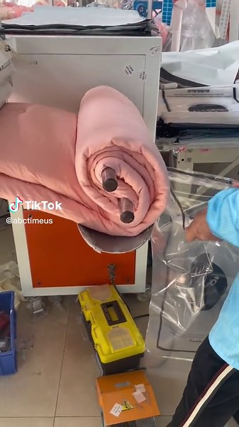 Efficient Fabric Folding Machine in Action