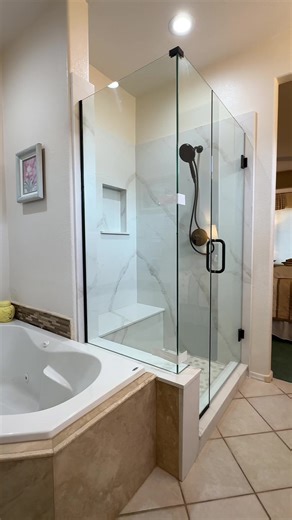 This display of a nice renovation of the master shower .