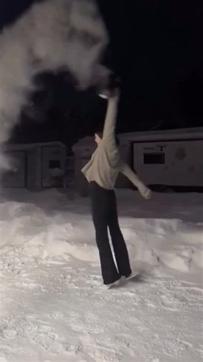 Viral News 🔥 on Instagram: "A winter science trick went horribly wrong… and the video is now shocking millions. 😳❄️ A woman attempted the popular “boiling water to instant ice” stunt — a trend that blows up every winter as temperatures drop. The idea is simple: throw boiling water into freezing air, and it instantly turns to ice crystals. When it works, it looks magical. But when it doesn’t… the results can be devastating. In this clip, she steps outside holding a flask of boiling water, expec