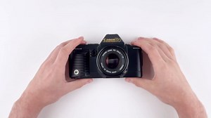 Canon T70 35MM SLR Film Camera kit With FD mount Zoom Lens Works with Color and B&W film. (Renewed)