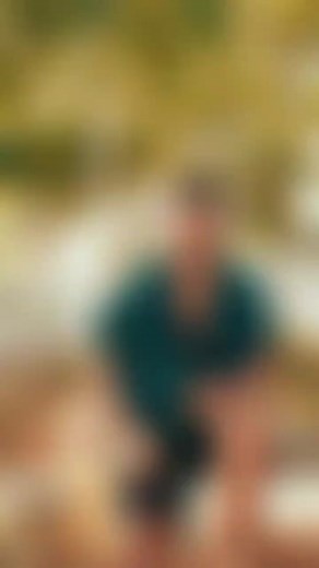 Man Enjoying Outdoor Activities in a Green Shirt