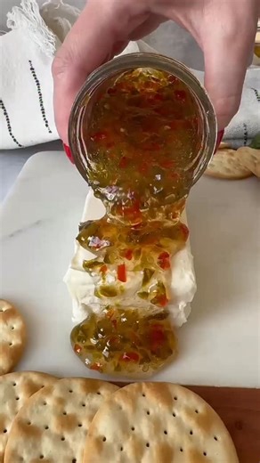 Lauren Allen on Instagram: "This Pepper Jelly is the appetizer that ALWAYS disappears first at every party! Comment “SEND RECIPE” and I’ll DM you the link! my husband introduced me to pepper jelly over cream cheese years ago and I was SKEPTICAL. Now? I literally can’t go to a party without someone asking if I’m bringing “that jelly.” 😅 Ingredients: 1 ½ cups finely diced bell pepper 1 lb jalapeños (about 10) 5 cups sugar 1 ¼ cups vinegar ¼ cup lime juice 1 tsp salt 3 oz Certo liquid pectin Instr