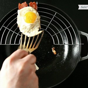 This extra-wide Staub USA pan has quite the resume: it roasts, braises, simmers, and even deep fries. Plus, it’s got a little stainless steel balcony (so bacon can drain mess-free). ON SALE THROUGH JANUARY → https://f52.co/2Ci77gn | Food52