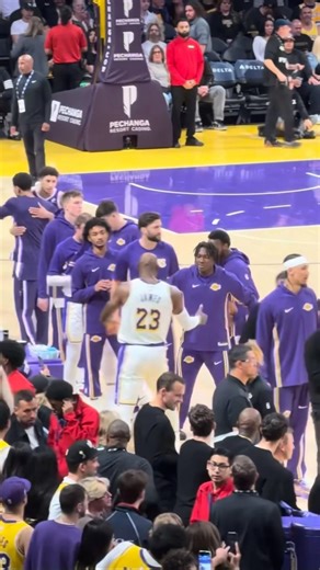 LeBron going through his pre game chalk toss routine