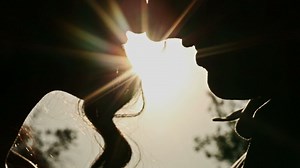 Silhouette of a kissing couple - Free Stock Video