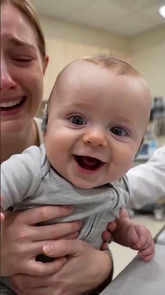 Baby First Time Hearing Reaction