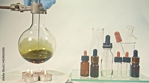 How to extract hemp oil. Extraction of useful substances from cannabis flowers using heat in a chemical laboratory. high quality video shot with video with BMPCC 6K in studio..