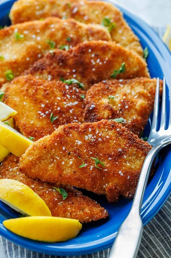88K views · 1.1K reactions | This homemade Chicken Schnitzel is an absolute favorite in our house. Thinly sliced chicken, coated in breadcrumbs, and pan-fried to golden perfection. RECIPE: https://natashaskitchen.com/chicken-schnitzel/ | NatashasKitchen.com | Facebook