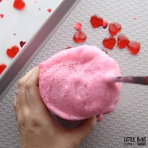 Bubbling, fizzing hearts slime! Love potions and slime making for a fun Valentine's Day theme! https://littlebinsforlittlehands.com/valentines-bubbly-slime-recipe/ | Little Bins for Little Hands