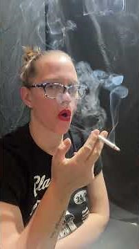 Smoking Layla Smoking Fetish Model is dangling And smoking hands free close up smoking