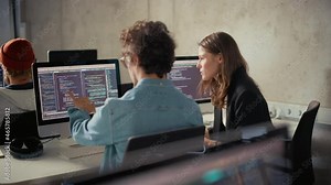 Smart Young Students Studying in University with Diverse Multiethnic Classmates. Scholars Collaborate in College Room on Computer Science Project, Writing Software Code in Successful Teamwork.