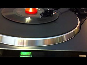 Onkyo CP-1046F Quartz Locked Direct Drive Turntable playing 7" 45