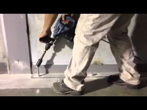 Fastening Angle Iron to Concrete Using 3/4" Wedge Anchors BUY AT ANCHORDOGTOOL.COM