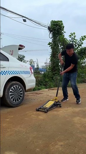 While Reversing, One Of The Wheels Accidentally Fell Off The Curb.