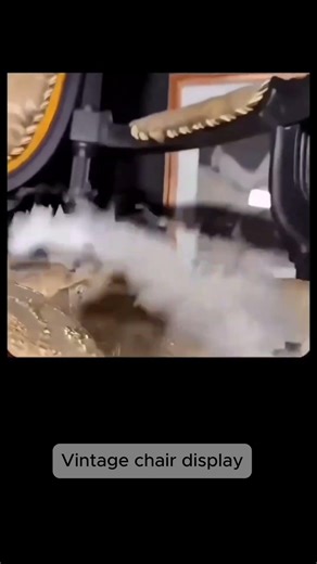 Decorative antique chair with spinning wheel display #design