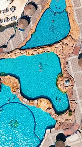 Escape to paradise at Seagull Beach Resort!Dive into our stunning waterfall swimming pool and experience ultimate relaxation by the Red Sea. Book your stay now and let the tranquility wash over you! #Hurghada #SeagullBeachResort #WaterfallPool #RedSeaLife #VacationVibes #hurghada_hotels #heartofhurghada #redsea #summer2025 #egypt #redseavibes | SeaGull Beach Resort Hurghada