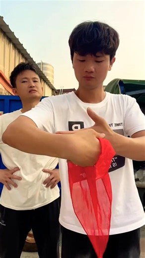 How Is He Pulling Cloth Through His Hand? 🤯 Impossible Magic Trick! #shorts #trending #vairal #usa
