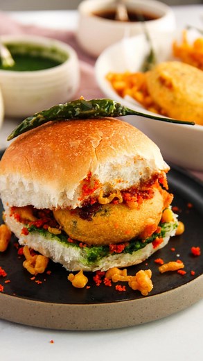 317K views · 1K reactions | It’s finally here! The most requested street-style Vada Pav recipe. I’m thrilled to share my mom’s mouthwatering recipe that I grew up eating, along with all our secret tips to make it super easy and fun to prepare. Get ready to bring the flavors of Mumbai to your kitchen! Commend “Vada Pav” and I will DM you the recipe! #mumbaifood #vadapav #desifood #indiancuisine #fathersdayspecial | Ministry of Curry | Facebook