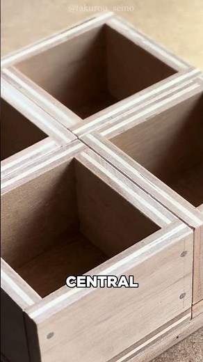 The Wooden Genius Behind a Rotating Box