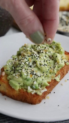 This savory Coconut Flour Bread has a wonderful light and fluffy texture. It’s easy, delicious, and makes great low carb and keto sandwiches. And it has only 1.6g carbs per slice! https://alldayidreamaboutfood.com/easy-coconut-flour-bread/ #coconutflour #ketobread #ketorecipes | All Day I Dream About Food