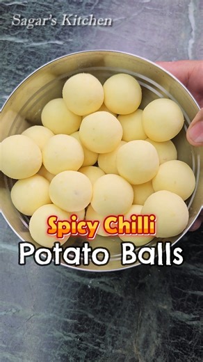 Sagar Kumar on Instagram: "Spicy Chilli Potato Balls...Satisfied & Delicious Recipe #Shorts #PotatoBalls #ViralPotato #PotatoRecipes #PotatoSnacks #recipe #Reels #Reels #AnnaKaFood #Shorts #Patato #SagarsKitchen #SpicyPotatoes #ChilliPotato"