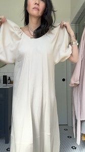 The Hostess Dress, a feminine yet unfussy favorite in a lightweight natural linen for summer. Styled here by @sparkandpepper with the Signature Cardigan. | goop