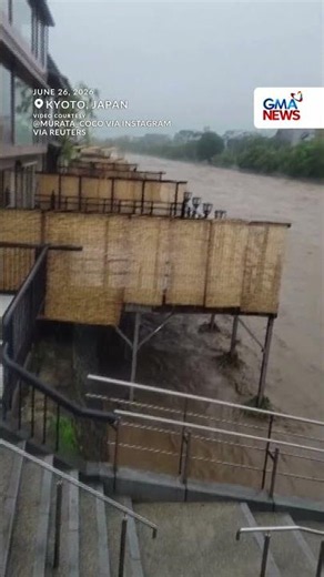Kyoto's Kamo River surges with muddy torrent after heavy rainfall | GMA News