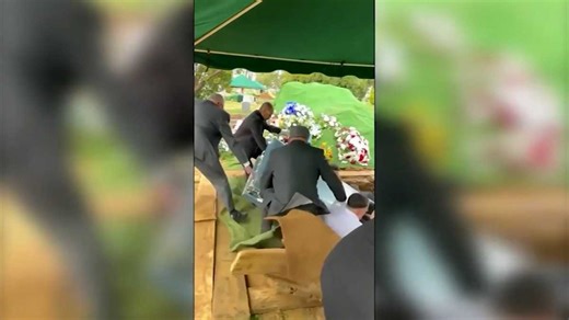 Shocking video shows pallbearers and casket falling into grave in Philadelphia