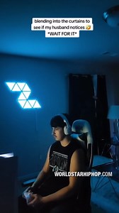 Creative Prank: Woman Painted Her Self With Blue Body Paint To Blend In With The Blue Curtains To Scare The Ish Out Of Her Husband!