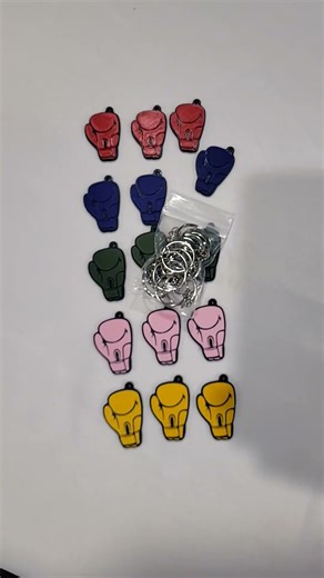 Boxing glove keychain. Designed by Walter Vzz.