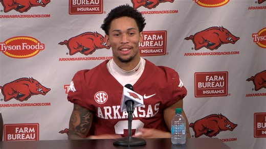 CJ Brown, Nsongbeh Ginyui and Steven Soles Jr. after Arkansas football Spring Game