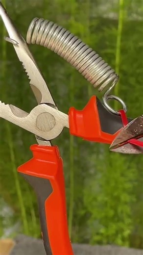 installing the spring on the pliers so that the pull does not loosen