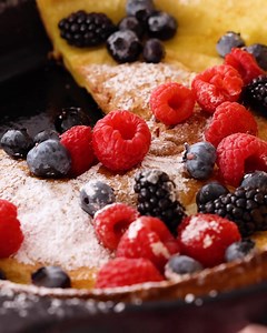 Big, puffy, and perfect for sharing, a Dutch Baby, also known as a German pancake, is a simple but indulgent breakfast. You only need a handful of kitchen staples to make this pancake recipe, and it puffs up beautifully with a custard-like center. | Preppy Kitchen