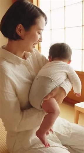 Japanese Woman Comforting a Baby#JapaneseMom #BabyCare #Motherhood