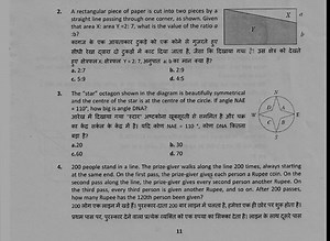 A rectangular piece of paper is cut into two pieces by a straig... | Filo