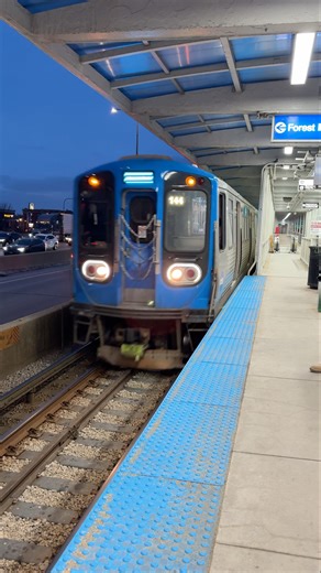 CTA Blue line train rolls into Irving Park