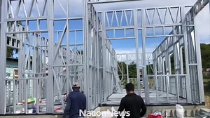 The controversial Chinese metal houses are going up. On Tuesday, some National Housing Corporation workmen were spotted at Scotts Gap, near Brittons Hill, St Michael securing the metal frames of one of the prefabricated structures of East West Building Solutions to the foundation. (Video by Jameel Springer) #Barbados #BarbadosNews #YourNewsYourTimeYourWay #NationBarbados #TheSourceMatters | The Nation Barbados