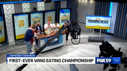 Wing eating contest at Big Ten Fan Fest