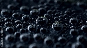 Close-up of bubble soda on black background in 4K resolution