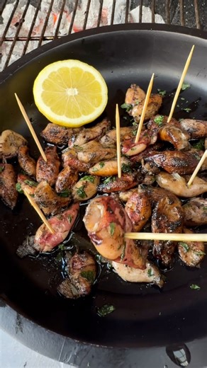 Arrow Squid, hot & fast in a skillet over Firebrand BBQ charcoal. Seared and tender in under 2 minutes. That’s how you level up your starters! | Come Grill With Me by Irene Sharp | Facebook