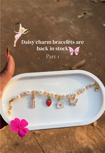 Daisy charm bracelets are back in stock!🧚🏽‍♀️ Each bracelet is special because only one of each is available! I’ve taken 5 MONTHS collecting charms to be able to relaunch these!! I have so many more, check out part two! Price: 25k each 0759796397 to order ##daisy##bracelet##flowerbracelet##tiktokuganda🇺🇬🇺🇬🇺🇬##smallbusiness