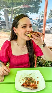 Caroline Cardamone on Instagram: "Comment your favorite kind of pizza! Details below 👇🏻 We got the sausage and pesto pizza, the veggie pizza, the caprese salad, and some cheesecake at Wild Tomato’s Sister Bay location and it was all to die for! Their outdoor patio is right by the beach, so you can sit outside and enjoy pizza and drinks while taking in the beautiful scenery. As a long time lover of Wild Tomato I was ecstatic when they asked me to come have lunch! #doorcounty #doorcountywi #trav