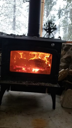 u asked. here is guest cabin view from fam/living room. fire, windows and snuggle couch #fun #offgridliving #idahome #tik_tok #explore #snow #views