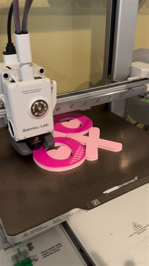 A Mothers Crafts on Instagram: "Started on my Valentine’s Day themed crafts. There’s so many cute files to 3d print it’s been so hard to pick which ones to do. My favorite are the little heart Polaroid holders but the one I’ve used the most - pretty much everyday - is the heart iPad holder 😍💖 Using my @bambulab_official A1 combo 3d printer #3dprinting #bambulab #craftersofinstagram #diy #valentinesday"