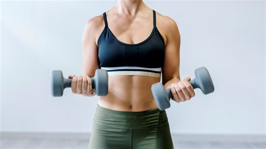 No, not push-ups — strengthen your pecs with a pair of dumbbells and these 4 exercises