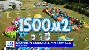 Spanning some 300 metres, the world's biggest jumping castle has arrived in Queensland! But the best thing about The Big Bounce is it isn't just for kids. #9News | 9 News