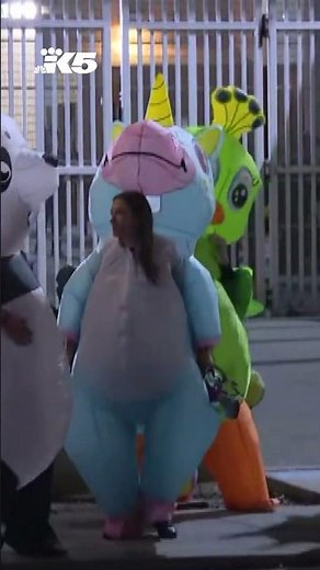 Protests in inflatable costumes gather outside Portland ICE facility