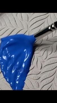 Ceramist exceptionally transforms a ceramic plate by coating it with glaze